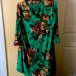 Green dressy dress with floral print. Very comfortable